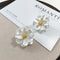 Chic White Acrylic Flower Stud Earrings - Velvet Haven