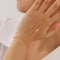 Gold Cross Hand Bracelet - Velvet Haven